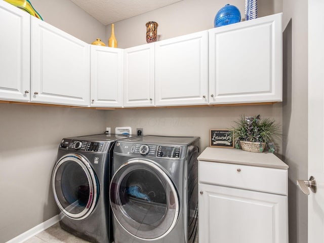 8105 Jitterbug Ln, Pickerington, OH 43147 - laundry room featuring independent washer and dryer and cabinet space