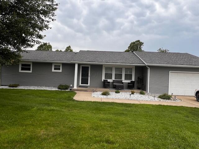 67682 Morristown Flushing Rd, Belmont, OH 43718 - ranch-style house featuring a garage and a front lawn