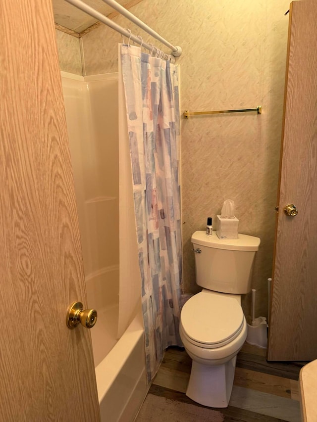 374 Pathfinder Trl, Logan, OH 43138 - full bathroom featuring shower / tub combo with curtain and wood finished floors