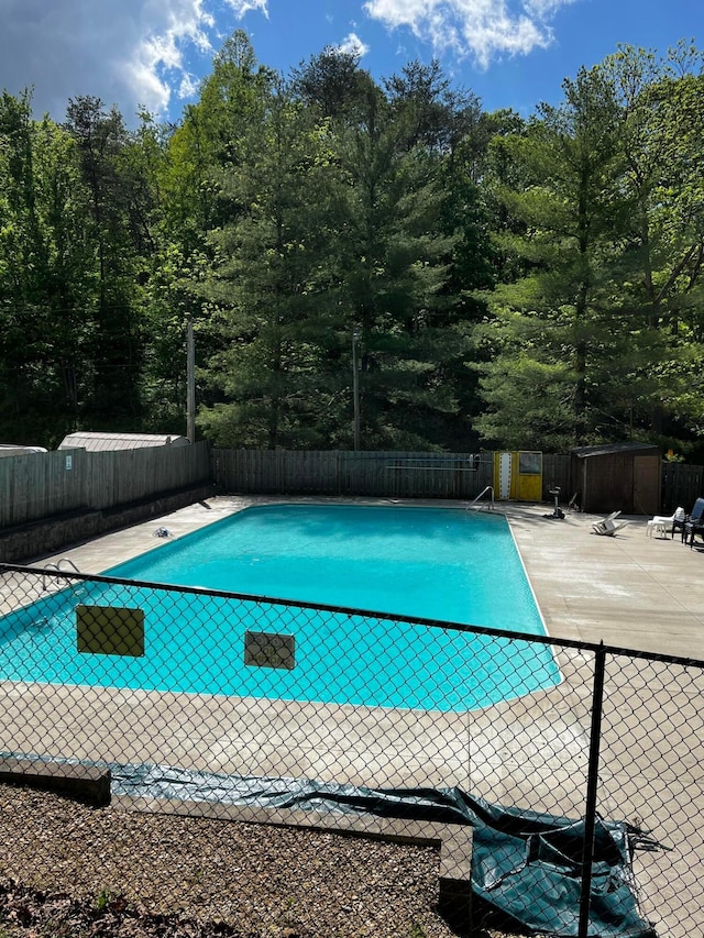 374 Pathfinder Trl, Logan, OH 43138 - view of swimming pool with a patio and an outdoor structure