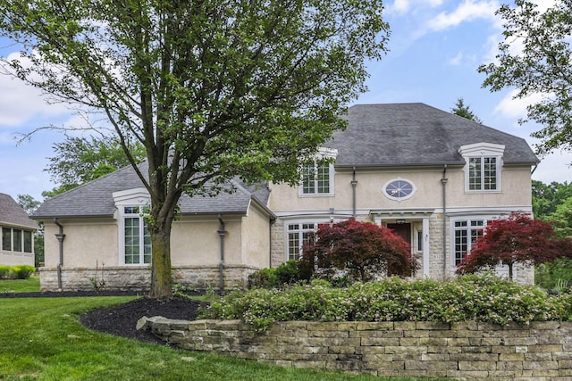 4329 Wyandotte Woods Blvd, Dublin, OH 43016 - french country home with stucco siding and stone siding