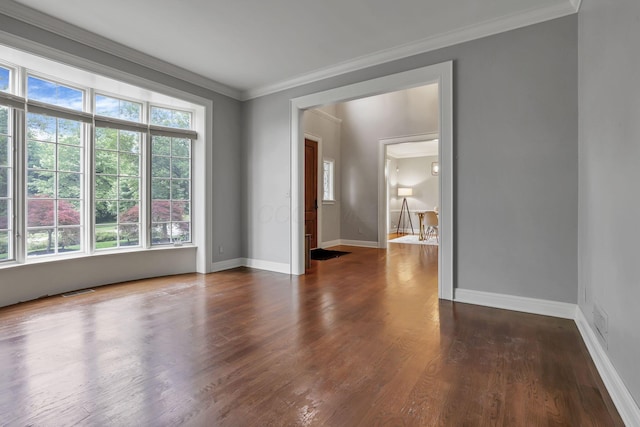 4329 Wyandotte Woods Blvd, Dublin, OH 43016 - unfurnished room with plenty of natural light, ornamental molding, and wood finished floors