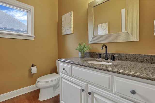 4329 Wyandotte Woods Blvd, Dublin, OH 43016 - half bathroom with vanity and wood finished floors