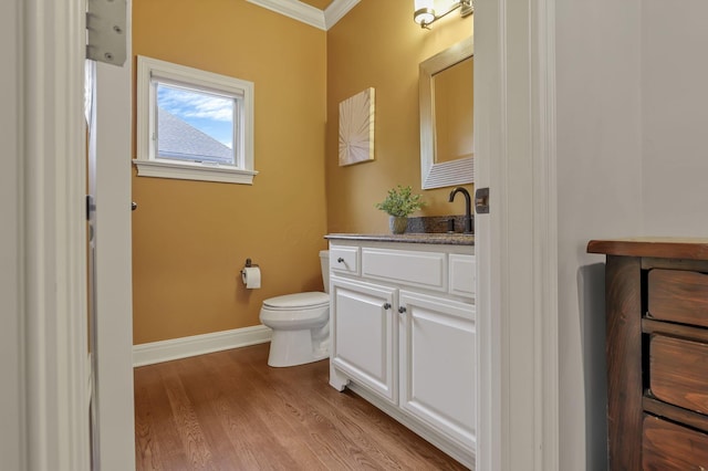 4329 Wyandotte Woods Blvd, Dublin, OH 43016 - bathroom with ornamental molding, vanity, and wood finished floors