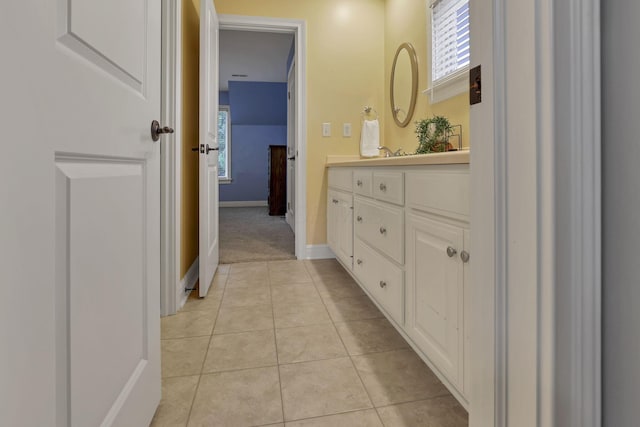 4329 Wyandotte Woods Blvd, Dublin, OH 43016 - bathroom featuring double vanity, tile patterned flooring, and healthy amount of natural light