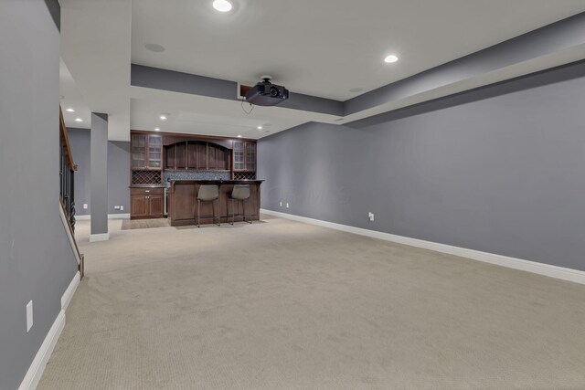 4329 Wyandotte Woods Blvd, Dublin, OH 43016 - unfurnished living room featuring wet bar, light colored carpet, and recessed lighting