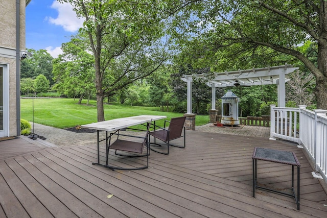 4329 Wyandotte Woods Blvd, Dublin, OH 43016 - deck featuring a pergola, a yard, outdoor dining space, and view of wooded area