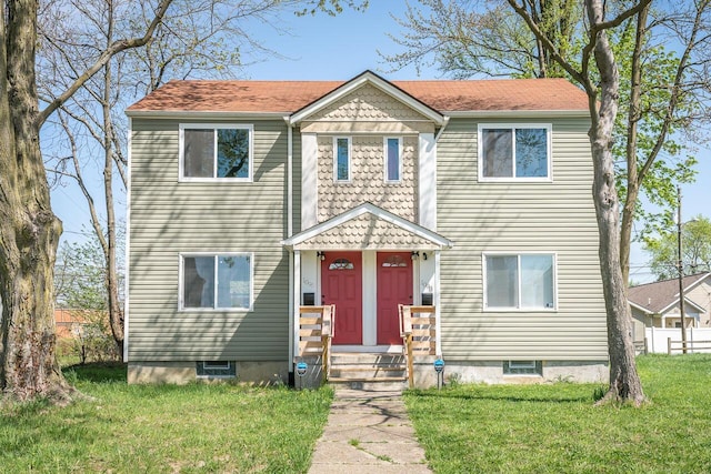 1096 E 22nd Ave Unit 1098, Columbus, OH 43211 - view of front of house featuring a front yard and roof with shingles