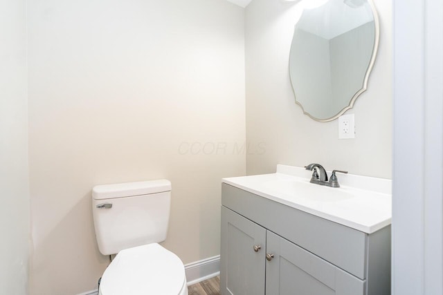 1096 E 22nd Ave Unit 1098, Columbus, OH 43211 - half bath featuring vanity and wood finished floors