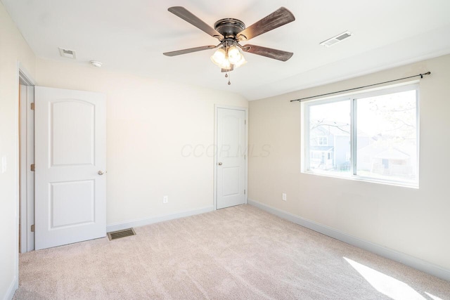 1096 E 22nd Ave Unit 1098, Columbus, OH 43211 - unfurnished bedroom with carpet and ceiling fan