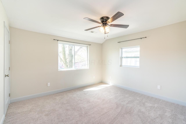 1096 E 22nd Ave Unit 1098, Columbus, OH 43211 - carpeted empty room featuring plenty of natural light and ceiling fan