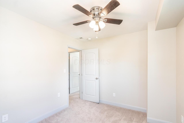 1096 E 22nd Ave Unit 1098, Columbus, OH 43211 - empty room featuring light colored carpet and ceiling fan