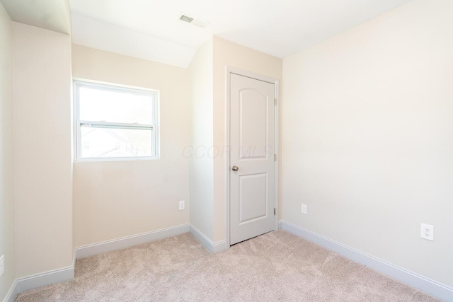 1096 E 22nd Ave Unit 1098, Columbus, OH 43211 - empty room featuring light colored carpet and baseboards