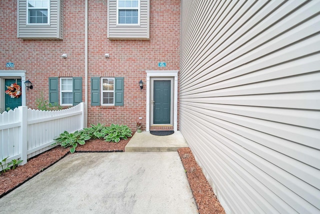 786 Spring Valley Dr, Lewis Center, OH 43035 - property entrance featuring brick siding and a patio area