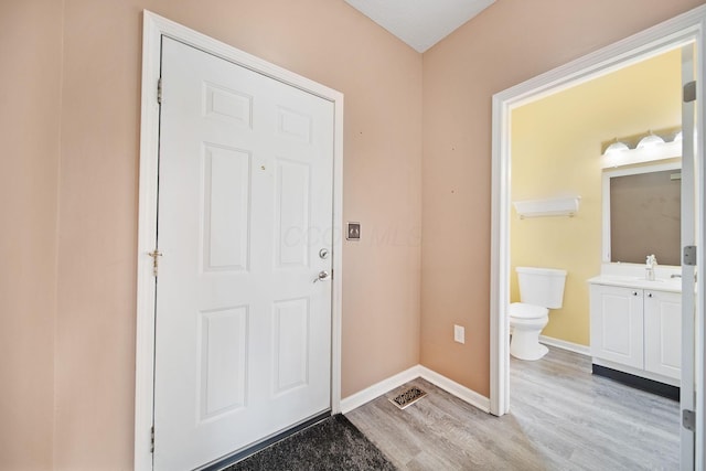 786 Spring Valley Dr, Lewis Center, OH 43035 - entryway with light wood-style floors and baseboards