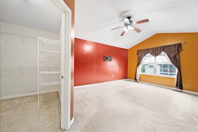 786 Spring Valley Dr, Lewis Center, OH 43035 - unfurnished living room with a ceiling fan, carpet flooring, and vaulted ceiling