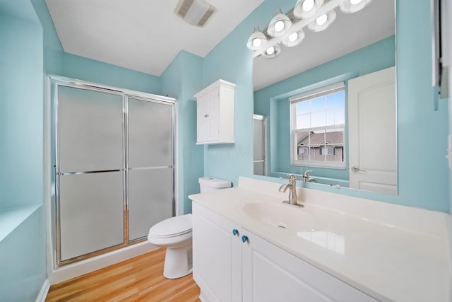 786 Spring Valley Dr, Lewis Center, OH 43035 - full bathroom with a stall shower, vanity, and wood finished floors