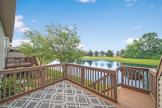 786 Spring Valley Dr, Lewis Center, OH 43035 - wooden terrace with a water view and view of scattered trees