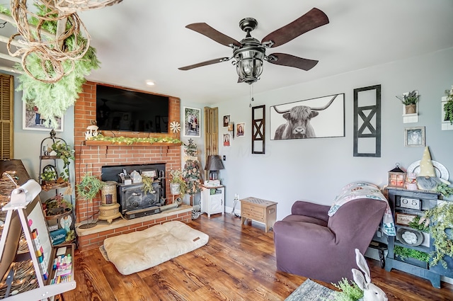 1849 Old Springfield Rd, New Holland, OH 43145 - living room with ceiling fan, wood finished floors, and a brick fireplace