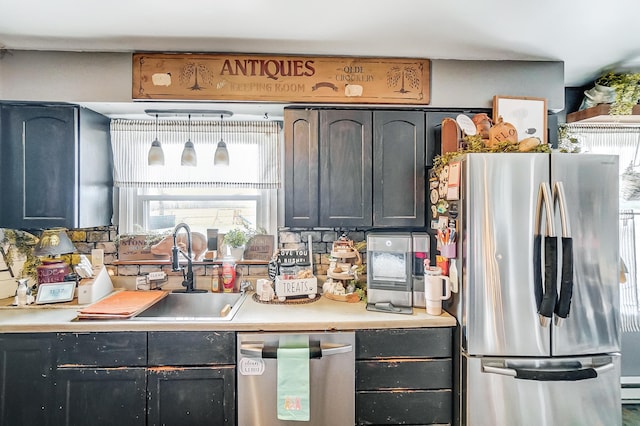 1849 Old Springfield Rd, New Holland, OH 43145 - kitchen featuring appliances with stainless steel finishes, light countertops, and healthy amount of natural light