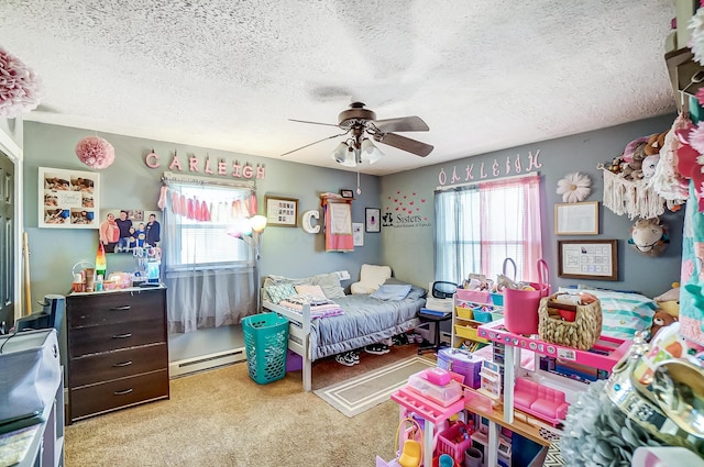 1849 Old Springfield Rd, New Holland, OH 43145 - carpeted bedroom with a baseboard heating unit, multiple windows, a textured ceiling, and a ceiling fan