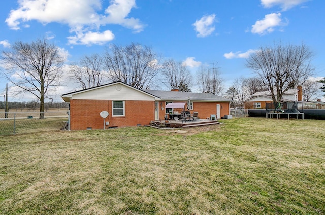 1849 Old Springfield Rd, New Holland, OH 43145 - back of house featuring brick siding, crawl space, a fenced backyard, and a chimney