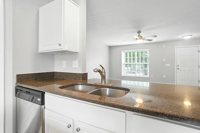 5632 Middle Falls St, Dublin, OH 43016 - kitchen with stainless steel dishwasher, white cabinets, a ceiling fan, and dark stone counters