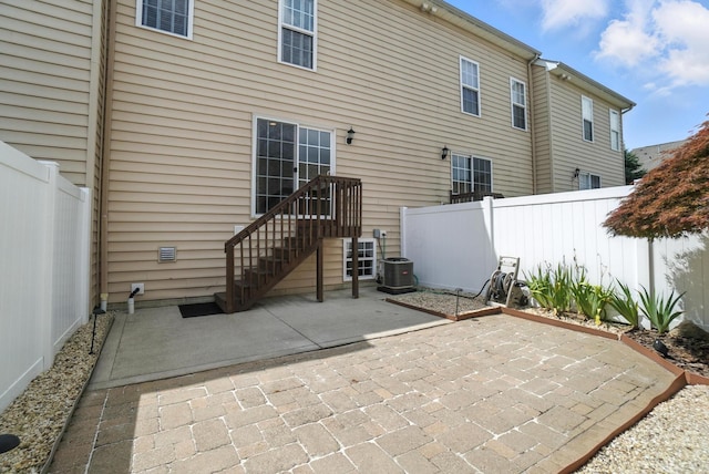 5632 Middle Falls St, Dublin, OH 43016 - back of house with a fenced backyard and a patio