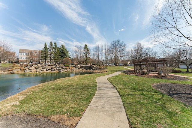 6057 Lakes At Taylor Station Dr, Columbus, OH 43213 - surrounding community with a lawn, a pergola, and a water view