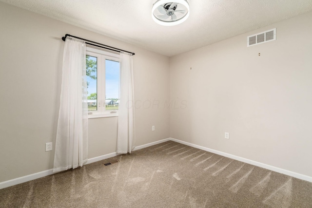 4909 Bixby Rd, Groveport, OH 43125 - carpeted spare room featuring a textured ceiling