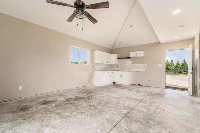 4909 Bixby Rd, Groveport, OH 43125 - unfurnished living room with unfinished concrete flooring, a ceiling fan, lofted ceiling, and recessed lighting