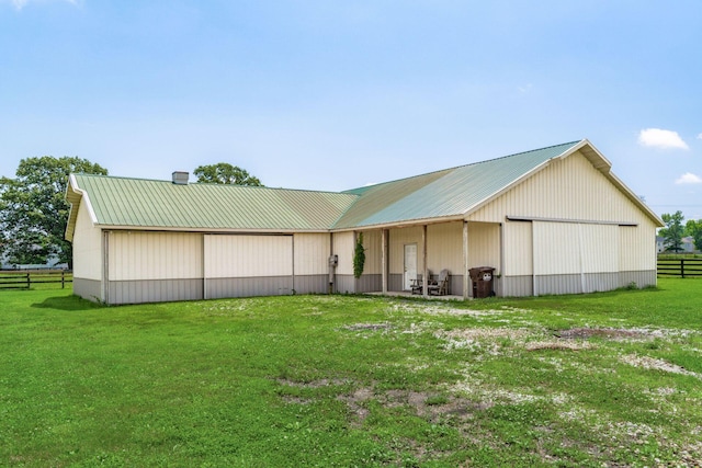 4909 Bixby Rd, Groveport, OH 43125 - back of house featuring a pole building, a metal roof, and an outdoor structure