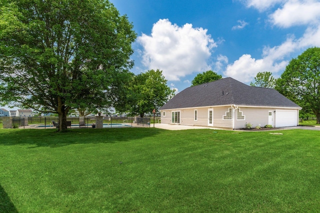 4909 Bixby Rd, Groveport, OH 43125 - rear view of house featuring a patio and driveway