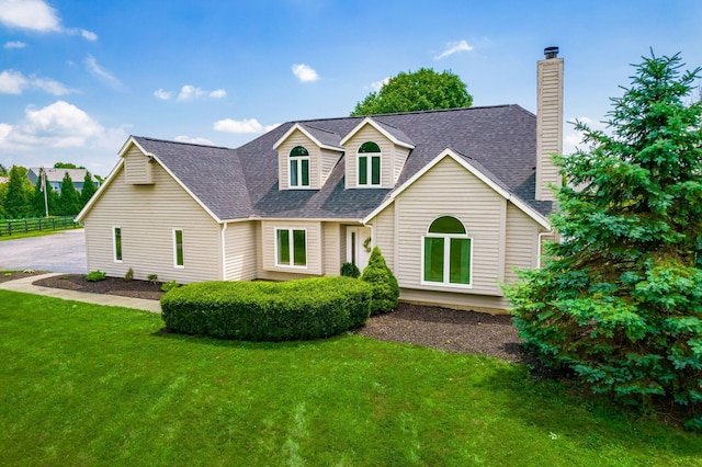 4909 Bixby Rd, Groveport, OH 43125 - view of front of home featuring roof with shingles and a chimney