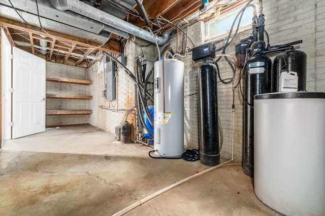 4909 Bixby Rd, Groveport, OH 43125 - unfinished basement featuring electric water heater, electric panel, and brick wall