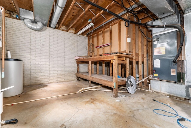 4909 Bixby Rd, Groveport, OH 43125 - below grade area with gas water heater, heating unit, and a workshop area