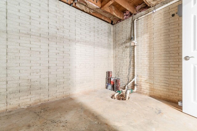 4909 Bixby Rd, Groveport, OH 43125 - unfinished below grade area featuring brick wall