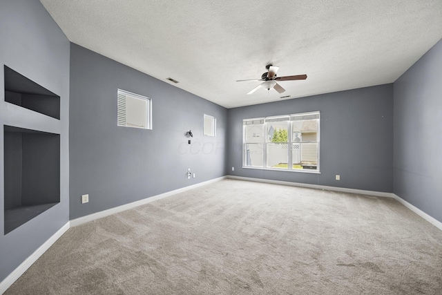 6067 Hayden Farms Rd, Dublin, OH 43016 - empty room with ceiling fan, carpet floors, and a textured ceiling