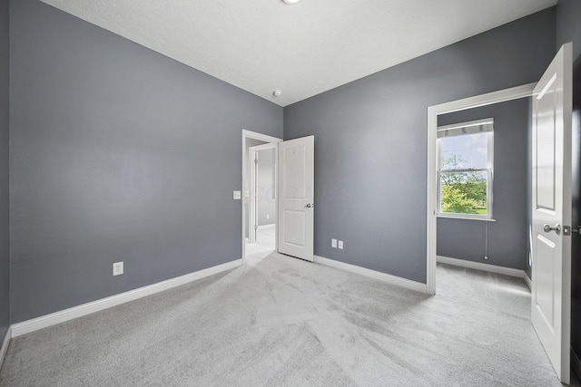 6067 Hayden Farms Rd, Dublin, OH 43016 - carpeted empty room featuring baseboards