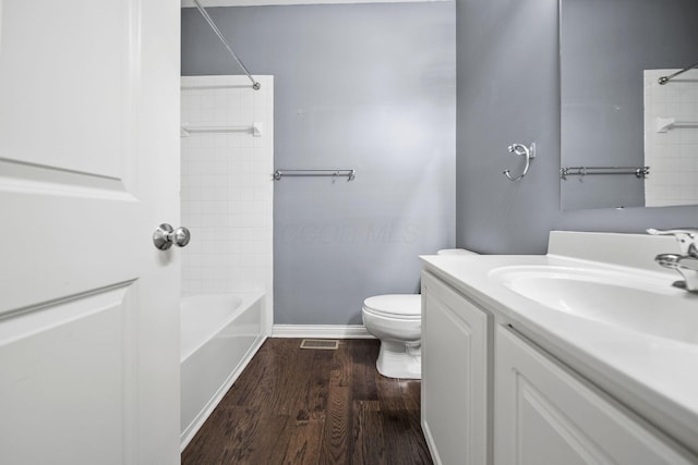 6067 Hayden Farms Rd, Dublin, OH 43016 - full bathroom featuring vanity, bathing tub / shower combination, and wood finished floors