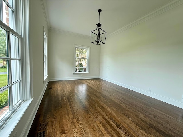 4945 Yantis Dr, New Albany, OH 43054 - empty room featuring a chandelier, ornamental molding, and dark wood-style flooring