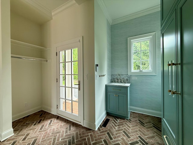 4945 Yantis Dr, New Albany, OH 43054 - doorway featuring brick flooring, healthy amount of natural light, and ornamental molding