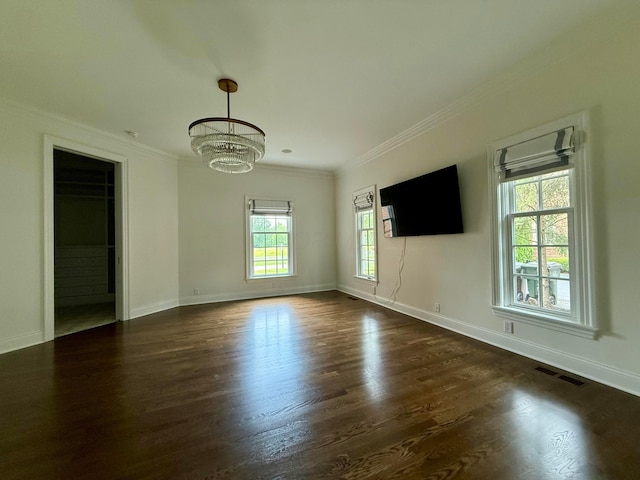 4945 Yantis Dr, New Albany, OH 43054 - unfurnished living room featuring a chandelier, ornamental molding, and dark wood finished floors