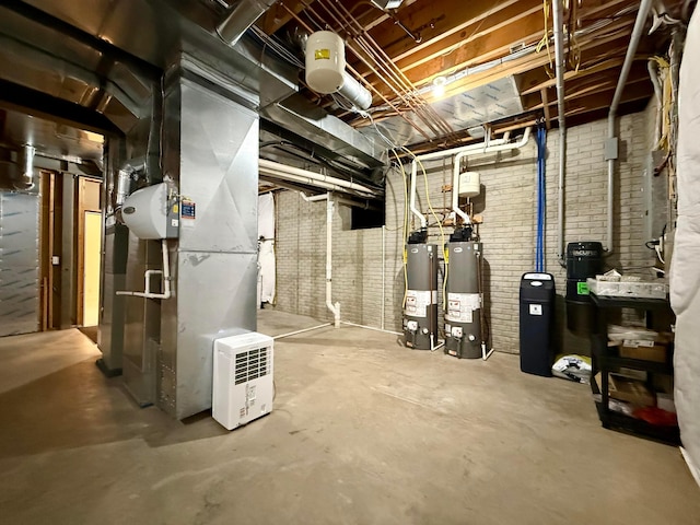 4945 Yantis Dr, New Albany, OH 43054 - unfinished below grade area featuring gas water heater, heating unit, and brick wall