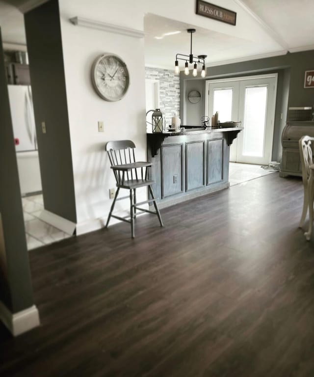 25327 Morris Salem Rd, Circleville, OH 43113 - dining space with ornamental molding, wood finished floors, and a chandelier