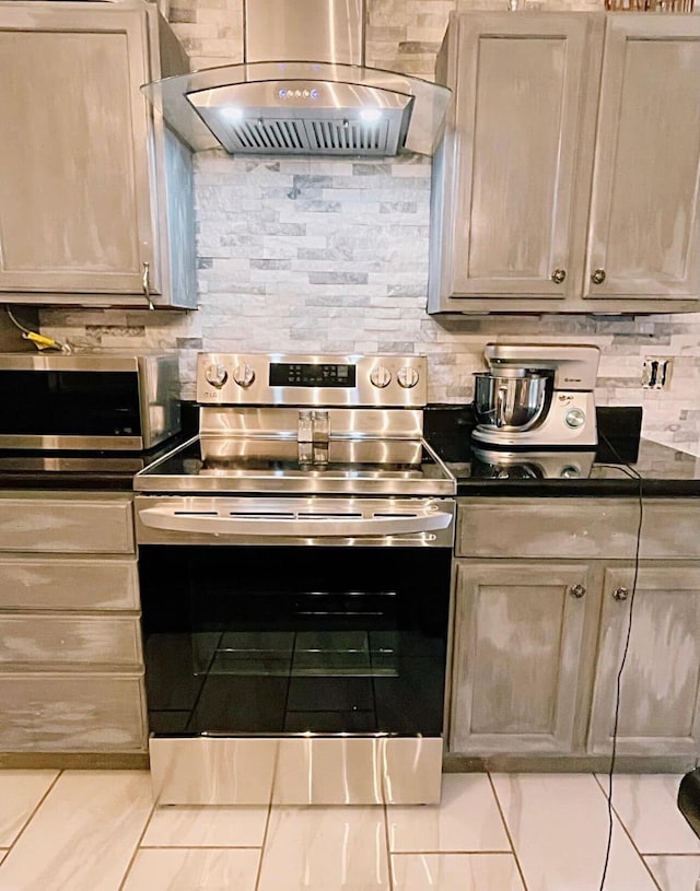 25327 Morris Salem Rd, Circleville, OH 43113 - kitchen featuring stainless steel appliances, wall chimney exhaust hood, dark countertops, and tasteful backsplash