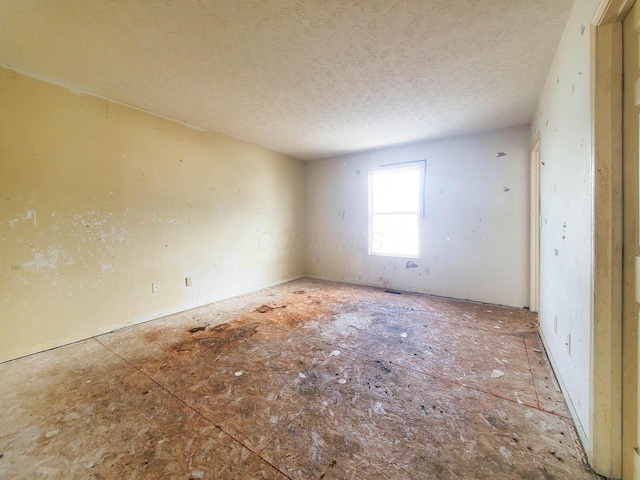 6063 Brice Park Dr Unit 14F, Canal Winchester, OH 43110 - empty room featuring a textured ceiling