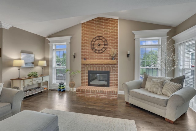 9606 Ireland Ct, Powell, OH 43065 - living room with lofted ceiling, wood finished floors, and a fireplace