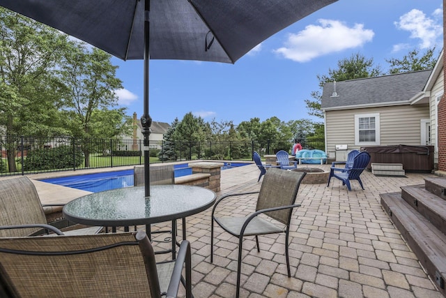 9606 Ireland Ct, Powell, OH 43065 - fenced backyard with a hot tub and a patio