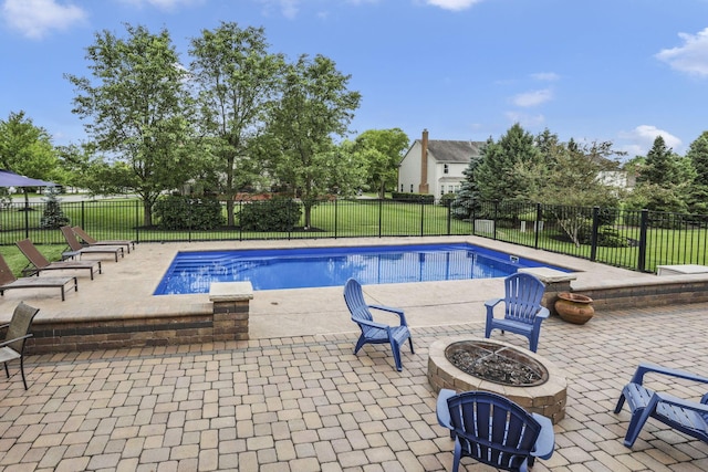 9606 Ireland Ct, Powell, OH 43065 - view of pool with an outdoor fire pit, a patio, and a fenced backyard